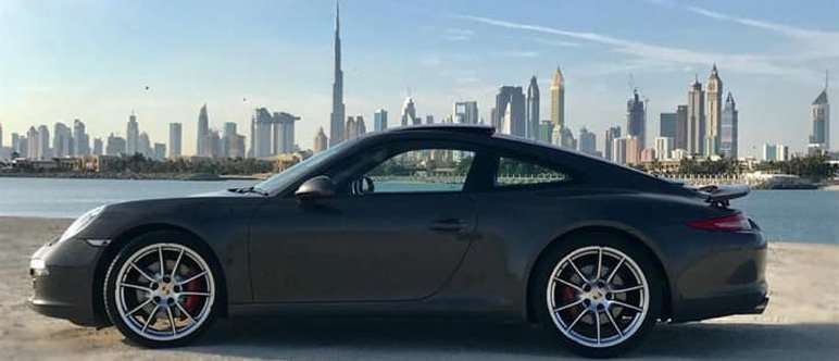 Black Porsche Dubai Skyline